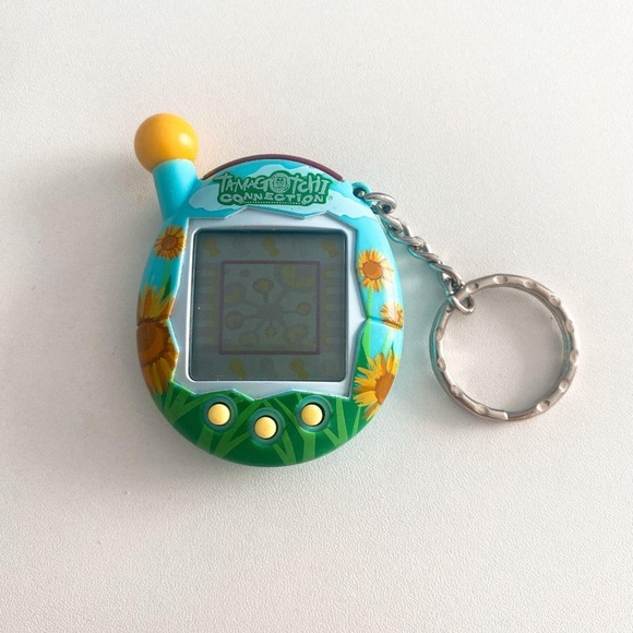 Tamagotchi Connection Handheld Console - Blue and Yellow